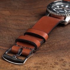 After years of creating leather watch straps for ourselves for use on a variety of watches, we are excited to release our version of the simple NATO leather strap. The NATO strap has an iconic history for a range of vintage military issued watches. We've tested this strap on a variety of watches, from Tudor and Timex to Luminox. It's a beautiful addition to new and vintage watches. Three widths available: 18mm, 20mm, and 22mm, sewn with durable dark brown poly cording. All straps are precisely c