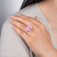 Gorgeous pink kunzite measuring 17mm round by 12mm deep set in 18k rose gold with white F-VS diamonds on the shank. .8 total carat diamond weight Made to order Luxury Pink Topaz Ring, Luxury Pink Topaz Ring With Diamond, Luxury Pink Topaz Round Ring, Luxury Pink Oval Topaz Ring, Luxury Pink Topaz Ring With Center Stone, Luxury Pink Amethyst Wedding Ring, Luxury Pink Amethyst Ring With Accent Stones, Luxury Pink Topaz Gemstone Ring, Brilliant Cut Pink Sapphire Diamond Ring In Rose Gold