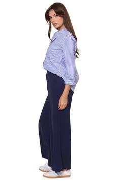 The Amiri Shirt is a timeless, button-up shirt in a traditional blue and white stripe. It features a chest pocket and a loose fit. Style it with jeans and layer it with a sweater vest for added warmth. Amiri Shirt, Candle Bags, Jumpsuit Jacket, Fit Style, Dress Romper, Hat Hairstyles, Sweater Vest, Summer Looks, Jacket Tops