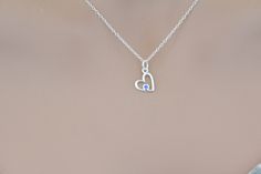 This is a beautiful Sterling Silver Birthstone Heart March Aquamarine Crystal Necklace. Both the charm and the chain are made from sterling silver. :) Measurement of charm in mm: Height: 14 Width: 9 Thickness: 1 (height includes jump ring) Measurement of necklace length in Inches: You will be able to select a 16, 18, or 20 inch chain. There are two types of chains, the regular chain or an upgraded chain option. Check out the last two pictures to see which chain you like best. Add a Swarovski Bir Sterling Silver Heart Birthstone Necklace, Silver Birthstone Necklace With Heart Charm, Heart-shaped Sterling Silver Birthstone Necklace As Gift For Her, Sterling Silver Heart-shaped Birthstone Necklace, Sterling Silver Heart Necklace With Birthstone For Wedding, Wedding Sterling Silver Heart Necklace With Birthstone, Wedding Heart Necklace With Birthstone In Sterling Silver, Sterling Silver Heart Charm Birthstone Necklace, Sterling Silver Open Heart Birthstone Necklace