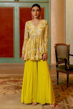 Lime yellow padded peplum kurta with geometric, floral print and dori, mirror embellishment. Paired with palazzo. - Aza Fashions Paulmi And Harsh, Rajdeep Ranawat, Kurta And Palazzo, Haldi Outfits, Sharara Gharara, Lime Yellow, Yellow Fits, Dhoti Pants, Palazzo Set