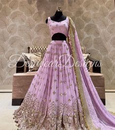 Made to Order/Measurement/Custom Order Lehenga - Color : Lavender - Fabric : Embroidered Georgette with gota work - Fully flared paneled lehenga - Embroidered  Blouse -  Net Dupatta with Gold Border - Drawstring closure with Tassels - - It can be customize in any design or size  PLEASE NOTE: BUYERS ARE RESPONSIBLE FOR ANY CUSTOMS AND IMPORT TAXES THAT MAY APPLY. This is a made to order product. If you opt for 'Made To Measurement Option', we will provide a measurement template and you can share Lavender Zari Work Sets For Wedding, Lavender Zari Work Wedding Sets, Lavender Wedding Sets With Zari Work, Lavender Wedding Set With Zari Work, Lavender Lehenga With Zari Work For Wedding, Lavender Wedding Set With Sheer Dupatta, Lavender Sharara With Sheer Dupatta For Wedding, Lavender Anarkali Sets For Receptions, Wedding Lavender Sharara With Sheer Dupatta