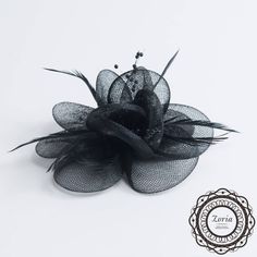 Great for headpieces or give you a favorite hats a new looks. It can be glue or saw on. More Colors available, if your favorite not on the list. Please contact our Customer Service for further assistance . Material: 100% Polyester Size: 6 X 6 X 1 inches Colors Black Brown Off White Purple White Elegant Mini Hats With Feathers For Gifts, Elegant Mini Hats With Feathers As Gifts, Elegant Mini Hat With Feathers For Gift, Elegant Mini Hat With Feathers As Gift, Elegant Black Feather Hair Accessories, Elegant Black Hair Accessories With Feathers, Black Fascinator For Kentucky Derby Gift, Elegant Black Mini Hats As Gifts, Elegant Black Fascinator With Handmade Flowers