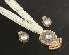 This is a stunning handmade necklace perfect for high end Jewelry Collector, a keeper in Traditional Vintage Indian/Pakistani Bridal jewelry and a Luxury Gift for your Daughter, Sister or Wife on Wedding or Anniversary. Perfect for any type of occasions, weddings And celebrations and a beautiful & memorable gift for weddings and special occasions. -Item Code:- L353 -White Beaded Rajwada Necklace Set with Earrings. -Designer multi layered beaded necklace with Kundan pendant. -Gold Plated Set with Kundan Stones which shine like Polki Diamonds. -Metal: Gold plated brass -Earrings are 35mm long & 27mm wide approx -Push Back Earrings -Necklace length with pendant 12.5" approx excluding adjustable dori/cord -Quantity: One Necklace Set Please see more different designs here:- https://www.etsy.com Luxury White Kundan Necklace, Luxury White Kundan Necklace For Wedding, Polki Diamond Necklace, Multi Layer Necklace Beads, Jodha Akbar, White Beaded Necklace, Pakistani Bridal Jewelry, White Beaded Necklaces, Diamond Necklace Set