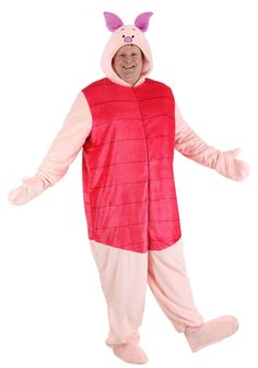 a man in a pink bunny costume is standing with his arms out and legs crossed