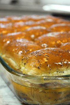 a casserole dish filled with food sitting on top of a counter