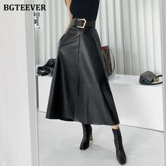 Brand Name: BGTEEVERSilhouette: A-LINEMaterial: PolyesterMaterial: Faux LeatherDecoration: SashesOrigin: CN(Origin)Waistline: Natural FactorsPattern Type: SolidStyle: CasualDresses Length: Mid-CalfAge: Ages 18-35 Years OldFabric Type: BroadclothGender: WOMENModel Number: BY6145item type: women PU leather skirts Long Leather Skirt, Pu Skirt, Pu Leather Skirt, Leather Skirts, Waist Sash, Mid Calf Dresses, Female Shorts, Drawstring Dresses, Women's Robe