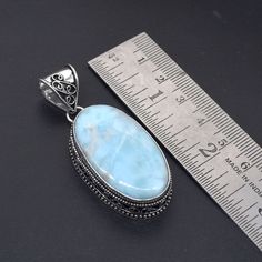 Welcome to your Shop Shop Link : https://uniquejewelstudio.etsy.com Stone: Natural Larimar Gemstone Shape: Oval Shape Metal:- 925 Silver ( Brass ) Jewelry Type:- Pendant Pendant Size : 2" Inch Pendant Weight : 13.50 gm Stock Code : PEN-11177 Embrace the tranquil beauty of the sea with this "Blue Larimar Vintage Pendant," crafted in 925 Sterling Silver. The captivating blue hues of the Larimar gemstone, set in a vintage-inspired design, create a timeless piece that evokes the serenity and allure Ocean Inspired Jewelry, Larimar Pendant, Vintage Pendant, Vintage Inspired Design, Ocean Inspiration, Brass Jewelry, Stone Necklace, Vintage Charms, Jewelry Gift