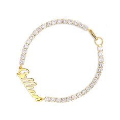 A classic look just for her, this glittering bracelet is certain to delight. A row of round stones radiate optimal shimmer. Uniquely designed, each shimmering stone is set to appear extra large and more brilliant, creating twice the sparkle. This classic name bracelet can come with yours or your loved one's name. She'll never tire of wearing this classic and sophisticated bracelet.Carat Weight: 5.78 ctStone Size: 2.8 mmNumber of Stones: 34 Stone Color: Diamond WhiteStone Shape: RoundMaterial: 92 Elegant Gold Crystal Bracelet Personalized, Dazzling Sparkling Diamond White Bracelet, Classic Crystal Diamond Bracelet With Sparkly Stones, Diamond White Bracelets With Sparkling Stones, Round, Classic Diamond Bracelet With Sparkling Stones, Glamorous Sparkling Cubic Zirconia Crystal Bracelet, Glamorous Sparkling Diamond Bracelet, Classic Bracelets With Bling In Cubic Zirconia, Personalized Elegant Crystal Bracelet