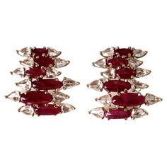 A very gorgeous and one of a kind, Ruby Stud Earrings set in 18K Rose Gold & Diamonds. The weight of the Rubies is 6.67 carats. The Rubies are completely natural, without any treatment and is of Mozambique origin. The weight of the Rose Cut Diamonds is 2.15 carats. Net Gold weight is 9.03 grams. The dimensions of the earrings are 2.30cm x 1.90cm x 0.50cm (L x W x D). The earrings have a simple push back. Ruby Stud Earrings, Ruby Earrings Studs, Ruby Rose, Stud Earrings Set, Rose Gold Diamonds, Natural Ruby, Rose Cut Diamond, Diamond Earrings Studs, 18k Rose Gold