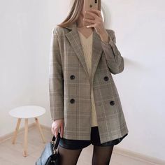 Our Leila Plaid Blazer is perfect to elevate your office look or make your casual outfit look more put together. It is double-breasted and slightly oversized. The blazer features notched lapels. side pockets. and black buttons. Material: Polyester. Cotton Casual Chique Stijl, Style Désinvolte Chic, Autumn Jacket, Best Blazer, Work Blazer, Straight Clothes, Women Blazer, Plaid Outfits, Double Breasted Jacket