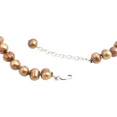 Set of two strands of dyed Chinese baroque cultured pearls. Both necklaces are golden in color but one is a darker mocha brown shade. Each features a sterling silver clasp with a chain that adjusts from 16.5"L to 18"L Elegant Brown Double Strand Necklace, Brown Pearl Pendant Necklace For Gift, Elegant Brown Necklace With Lobster Clasp, Brown Single Strand Pearl Necklace For Gift, Brown Pearl Jewelry With Round Beads, Elegant Brown Single Strand Pearl Necklace, Brown Pearl Round Beads Jewelry, Elegant Brown Necklace With Pearl Pendant, Elegant Single Strand Brown Pearl Necklace