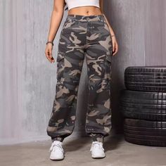 Embrace a bold and edgy look with our Camouflage Straight Bottom Elastic Band Jeans, designed to keep you stylish and comfortable throughout the summer. These retro-inspired jeans feature a classic straight-leg cut that offers a relaxed fit while still maintaining a sleek silhouette, making them perfect for casual outings, outdoor adventures, or even an edgy streetwear style. The all-over camouflage print adds a trendy, military-inspired vibe, giving your outfit a distinctive edge.Crafted from high-quality, lightweight denim, these jeans are perfect for keeping cool during warm summer days. The elastic band at the waist ensures a snug yet comfortable fit, allowing you to move freely without any restriction. This all-matching design means that these jeans pair effortlessly with a wide range Camouflage Jeans, Edgy Streetwear, Street Fits, Work Pants Women, Camouflage Colors, Plaid Vest, Denim Patterns, Spring Women, Winter Casual