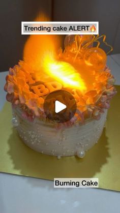 a burning cake with the words trending cake alert and burning cake on it's side