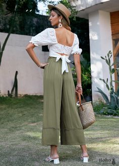 All size women's khaki green bohemian flare pants These khaki green All Size Boho Flare Pants can be worn casually with a crop top and sandals or elegantly with a stunning blouse and heels. These pants are definitely in style right now, with their high waist, tassel-tassel drawstring, and openwork embroidery. Fabric: viscoseFit: wide legDetails: stretchy waistband, drawstring with tassels, openwork embroiderySeason: spring, summer Collections: Bohemian Bottoms, Boho Pants Bohemian Flare Pants, Boho Flare Pants, Boho Bottoms, High Waist Wide Leg Pants, Womens Khakis, Boho Pants, Boho Green, Green Pants, Green Lace