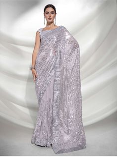 Product Features: Saree Color: Silver Blouse Color: Silver Saree Fabric: Georgete Blouse Fabric: Georgete Work: Sequance Wash: Dry Clean Occasion: Party Product Type: Saree Disclaimer: There will be slight difference in digital to actual image Sequin Saree Party Wear, Mirror Saree, Sequins Saree, Silver Blouse, Grey Saree, Grey Mirror, Designer Sarees Collection, Silver Print, Silver Fabric