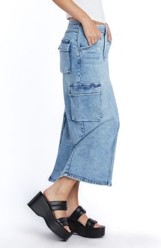 Perfect your casual-cool vibe in this trend-right denim maxi skirt designed in a faded wash with cargo pockets and an airy back vent. 31 1/2" length 72% cotton, 17% rayon, 10% polyester, 1% spandex Machine wash, tumble dry Imported Mid-rise Denim Cargo Skirt, Mid-rise Denim Cargo Skirt For Spring, Spring Mid-rise Denim Cargo Skirt, Casual Denim Maxi Skirt With Pockets, Spring Straight Leg Maxi Skirt With Pockets, Spring Straight-leg Maxi Skirt With Pockets, Spring Maxi Skirt With Pockets And Straight Leg, Utility Style Medium Wash Denim Skirt, High Rise Cotton Cargo Skirt In Medium Wash