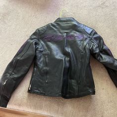 Fox Creek Leather. Womens Size Xs. Black With Purple Embroidery. Worn Only A Few Times. Made In Usa. Leather Jacket Women, Fitted Purple Leather Jacket For Fall, Magic Fox Leather Jacket, Fitted Embroidered Black Outerwear, Fitted Long Sleeve Embroidered Biker Jacket, Maroon Motorcycle Jacket, Fitted Long Sleeve Embroidered Leather Jacket, Fitted Black Embroidered Biker Jacket, Leather Jacket Women Purple