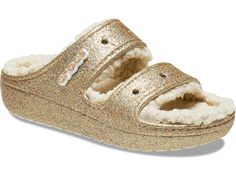 Crocs Classic Cozzzy Sandal - Shoes : Multi/Gold Glitter : This style comes with a removable Crocs Logo Jibbitz charm. Give your feet the control, comfort, and adaptive fit they require in the Crocs Classic Cozzzy Sandal. Chic and elegant design with all the feels of a slipper. Lightweight with durable construction. Easy slip-on entry. Classic rounded open toe. Contoured footbed for added comfort. Durable and lightweight molded EVA outsole with tread pattern for added traction. Textile upper, li Classic Cozzzy Sandal, Faux Fur Sandals, Fuzzy Slides, Fur Sandals, Men's Beanies, Saltwater Sandals, Glitter Sandals, Crocs Classic Clogs, Water Sandals