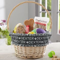 a wicker basket filled with cookies and treats