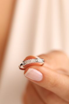 Diamond, which is the hardest material in the world formed centuries ago, has turned into a symbol showing the infinity and value of love over the years. We carefully design these jewels that you will wear as a symbol of the eternity of your love. 🔻Diamond ring will look amazing on your lover's finger! 🔻Engagement rings will bring luck to your new family! 🔻Promise Ring will connect lovers forever! 🔶 Total Carat: 0.17CT 🔶 Stone Pieces: 13 🔶 Main Stones Measurement: 0.17CT - 2.00X1.10MM 🔶 Gold Carat: 14 K  🔶Silver 925 💌 Zircon Stone 📌Zircon is a stone that strengthens the mind and memory. 📌It opens the closed chakras of people and revitalizes the aura. 📌It provides easy sleep. It helps to keep people away from bad dreams and nightmares. 📌It has a healing effect on emotional fluc Emerald Cut Baguette Diamond Promise Jewelry, Baguette Cut Jewelry With Diamond Accents For Promise, Baguette Cut Diamond Promise Ring Jewelry, White Gold Promise Ring With Baguette Diamonds, White Gold Open Ring With Baguette Diamonds, Baguette Cut Diamond Accented Stackable Promise Rings, Sterling Silver Baguette Diamond Promise Ring, Baguette Cut Stackable Rings With Diamond Accents, Silver Rings With Baguette Diamonds