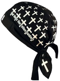 a black and white hat with crosses on the front, tied up to it's side