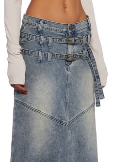 This maxi skirt has a denim construction, two adjustable belt straps in front, back pockets, and a front button and zipper closure. High Waist Medium Wash Skirt With Belt Loops, Spring Denim Skirt With Belt, Medium Wash High Waist Skirt With Belt Loops, High Waist Dark Wash Skirt With Belt Loops, Belted Denim Skirt For Spring, High-waisted Denim Skirt With Belt Loops, High-waist Denim Blue Skirt With Belt Loops, Mid-rise Skirt With Belt Loops In Medium Wash, Trendy Belted Denim Skirt