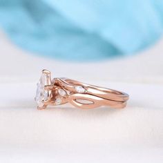 a rose gold engagement ring set with an oval cut diamond