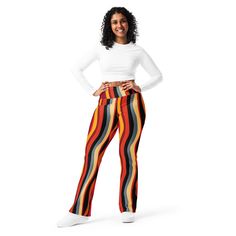 Designed to enhance your figure, these trendy leggings feature a high waist and a butt-lifting cut. The flared leg bottoms add a touch of style and make the leggings comfortable. Wear them on a walk, to the gym, or style them up with a bomber jacket or hoodie. * 74% recycled polyester, 26% elastane * Fabric weight (may vary by 5 7.37 oz./yd.² (250 g/m²) * Soft and stretchy premium quality fabric with a mild compression feel * Moisture-wicking fabric * UPF 50+ protection * High-waisted with a butt-lifting cut * Flared design from the knee down * Double-layered waistband with a pocket on the inside * The fabric is OEKO-TEX 100 standard certified * Blank product components sourced from China and Turkey Disclaimer: If body measurements fall between sizes, size up for a comfortable fit and size Trendy Fitted Yoga Pants, Trendy High Waist Fitted Yoga Pants, Trendy Fitted High-waist Yoga Pants, Trendy Wide Leg Yoga Leggings, Multicolor Stretch Bottoms For Fall, Fitted Multicolor Leggings For Fall, Trendy Fitted Yoga Pants For Fall, Fall Multicolor Fitted Leggings, Trendy High Waist Yoga Pants