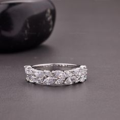 Full Eternity Moissanite Diamond Band, Half Eternity Marquise Diamond Band, 14k Solid Gold Double Row Marquise Diamond Anniversary Band, Fine Jewelry, Marquise Weeding Band, 4*2 mm Marquise Cut Moissanite Band, Anniversary Band, Engagement Band,  Side Stone: Type: Moissanite Cts: 1.80 TCW Approx. Size: 6*3 MM Shape: Marquise Cut Color: D-E-F Clarity: VVS Side Stone: Type: Moissanite Cts: 0.72 TCW Approx. Size: 4*2 MM Shape: Marquise Cut Color: D-E-F Clarity: VVS Band Width: 3.20 mm Approx Can Be Customized in 10/14/18k Yellow/Rose/White Gold And Platinum Or Sterling Silver. For More Video And Image Please Message us. Why buy Moissanite over Diamond? ● Moissanite is pocket-friendly, it is almost 1/10 of the diamond price. ● Moissanite is Conflict-free and eco-friendly, whereas a diamond can Marquise Diamond White Eternity Band For Anniversary, Anniversary Marquise Cut Cubic Zirconia Eternity Band, Cubic Zirconia Marquise Cut Eternity Band For Anniversary, Marquise Cut Cubic Zirconia Eternity Band For Anniversary, Marquise Diamond Eternity Band For Wedding, Wedding Eternity Band With Marquise Diamond Cut, White Gold Marquise Eternity Band For Anniversary, White Marquise Cut Cubic Zirconia Eternity Band, Marquise Cut Cubic Zirconia Eternity Band For Wedding