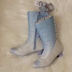 Disney Elsa Frozen Boots Blue And White New With Tags Genuine, Original, Authentic Disney Store Iridescent Glitter Coating; Decorative Pearl Buttons; Snowflake Screen Art Faux Leather Uppers; Full Zip For Easy On And Off Non-Slip Heel And Sole Please Note Shoes Run Small Elsa Shoes, Purple Rain Boots, Girls Cowgirl Boots, Disney Princess Toddler, Toddler Winter Boots, Frozen Blue, Costume Boots, Screen Art, Glitter Boots