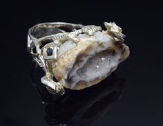 Raw Agate Tree Branch Silver Ring, Handcrafted Nature Ring With Geode Agate Discover the raw beauty of nature with this handcrafted silver signet ring. Each piece features a unique raw geode agate, embraced by a detailed branch design, representing the earth's untouched splendor. The ring's rugged texture and organic form make it a striking statement piece. Perfect for those who wear their connection to the earth on their sleeve. Embrace your love for the natural world with this one-of-a-kind ri Unique Raw Jewelry For Weddings, Unique Raw Jewelry For Wedding, Agate Open Ring Jewelry, Agate Gemstone Open Ring Jewelry, Silver Agate Open Ring, Silver Nature-inspired Jewelry With Large Stone, Silver Agate Geodes For Gift, Silver Agate Geode As A Gift, Silver Agate Wedding Jewelry