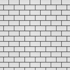 a black and white brick wall textured with thin lines in the middle to create a pattern