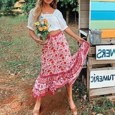 Unleash Your Inner Bohemian Spirit With This Stunning Floral Skirt! This Flowy Midi Skirt Features A Comfortable Elastic Waist For A Flattering Fit That Moves With You. The Vibrant Floral Print Adds A Touch Of Whimsy, Making It Perfect For Festivals Or A Breezy Summer Day. Dress It Up With A Crop Top Or Keep It Casual With A Tee. This Versatile Skirt Is A Must-Have For Any Wardrobe And Makes A Fantastic Gift For Yourself Or Your Best Friend! Boho Midi Skirt Pull-On Style Elastic Drawstring Waist Summer Bohemian Floral Print Skirt, Bohemian Floral Print Summer Skirt, Bohemian Floral Print Skirt For Summer, Summer Flowy Red Maxi Skirt, Red Flowy Maxi Skirt For Summer, Flowy Red Maxi Skirt For Summer, Bohemian Summer Skirt For Day Out, Red Summer Maxi Skirt For Day Out, Red Maxi Skirt For Summer Day Out