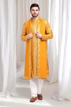 Yellow kurta with checkered patterns, embellished by sequins. Comes with pant and dupatta. - Aza Fashions Anarkali Style Cotton Silk Festive Sherwani, Anarkali Cotton Silk Sherwani For Festivals, Festival Cotton Silk Bandhgala With Dupatta, Traditional Drape Kurta With Mirror Work For Eid, Eid Cotton Silk Bandhgala With Dupatta, Eid Bandhgala With Dupatta In Cotton Silk, Navratri Cotton Silk Sherwani With Dupatta, Festive Kurta With Mirror Work For Traditional Ceremonies, Festive Cotton Silk Sherwani For Traditional Ceremonies