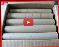 an open cardboard box filled with rolls of toilet paper and the video below shows how to use it