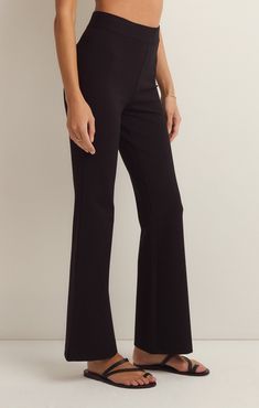 We love a good flare pant and the Do It All Flare Pant has it all! This chic high rise pant features a slim fit throughout the hips, a kick flare, and our fave detail; the supportive feel from the durable, stretchy fabric. Z SUPPLY Women's Do It All Flare Pant, Black, Extra Small Black Flare Wide Leg Pants For Office, Elegant Black High-waisted Flare Pants, Elegant Black High-waisted Flares, Chic Mid-rise Black Flares, Chic Black Mid-rise Flares, Tailored Flare Bottoms For Office, Tailored Flare Office Bottoms, Classic Flare Workwear Bottoms, Tailored Flare Black Pants