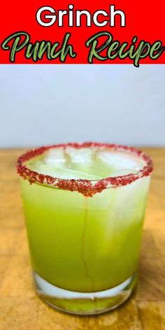 a green drink in a glass with the words grin punch recipe on it and an image of