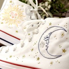 These custom trainers take the classic Converse high tops and transform them into unique pieces of wearable art. I only purchase 100% genuine shoes from the official converse website. I then use high quality embroidery thread to embroider the outsides of each shoe with my sun and moon design. I use metallic thread to embroider specific parts of this design to really make the stars twinkle and the moon glow! Sizes are in standard woman UK sizes. **Because each pair of trainers are made to order I do not provide refunds if the shoes do not fit, so be sure that you have ordered the correct size.** Please check my processing times before placing an order as it can vary depending on my current workload. However, if you need them in a quicker time frame then don't hesitate to send me a message t White Cotton High-top Sneakers With Embroidered Logo, Chuck Shoes, Embroidered Moon, Chucks Shoes, Embroidery Converse, Converse Embroidery, Cool Converse, Converse Design, Moon Embroidery