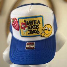 Have A Nice Day Trucker Hat. Happy Face With Middle Finger And Strawberry. Fun Blue Trucker Hat For Vacation, Trendy Blue Trucker Hat For Vacation, Retro Blue Cap Hat, Retro Blue Cap, Blue Retro Cap, Trendy Blue Hat With Flat Brim, Blue Trucker Hat For Spring Vacation, Blue Retro Adjustable Hats, Blue Short Brim Baseball Cap For Spring