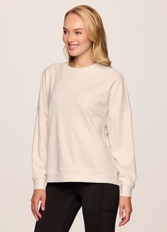 Midweight, silky soft waffle fabric, a cozy relaxed fit and a timeless crewneck design all combine to create our Off Days Relaxed Waffle Knit Sweatshirt. Great for layering or wearing on its own, plus a longer hemline in back offers added coverage where you want it most. Comfortable Crew Neck Sweater With Soft Texture, Versatile Crew Neck Tops With Ribbed Cuffs, Cozy Fit Soft Knit Crew Neck Sweatshirt, Solid Crew Neck Sweater With Soft Texture, Versatile Tops With Ribbed Cuffs For Layering, Comfy Sweatshirt For Layering With Soft Texture, Soft Texture Solid Color Sweatshirt For Spring, Soft Texture Sweatshirt For Spring, White Soft Texture Tops For Layering