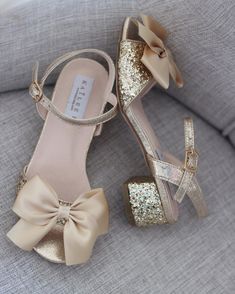 Cute Ankle Strap Sandals For Party, Party Sandals With Bow And Round Toe, Party Sandals With Satin Bow And Block Heel, Gold Open Toe Sandals With Bow, Gold Sandals With Bow For Party, Gold Party Sandals With Bow, Gold Heels With Bow And Round Toe, Flower Girls Shoes, Sandals With Bow