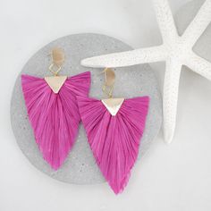 Introducing our stunning summer style LaLa statement earrings, handcrafted from high-quality natural dried palm leafs and featuring an array of bright and vibrant colors that perfectly capture the essence of the season. These earrings are the perfect accessory for any warm weather occasion, from beach parties to outdoor festivals and everything in between. Measuring at a comfortable and lightweight size, these earrings are designed to make a bold statement and add a pop of color to any outfit. T Summer Vacation Drop Earrings, Spring Beach Tassel Drop Earrings, Summer Vacation Tassel Drop Earrings, Summer Drop Earrings For Vacation, Natural Color Earrings For Vacation In Spring, Natural Color Drop Earrings For Summer, Natural Earrings For Vacation In Spring, Summer Beach Dangle Tassel Earrings, Multicolor Tassel Earrings For Summer Beach