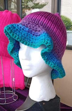 Handcrafted colorful pink purple & blue Bucket Hat  Size: Fits Teens & Adults Craftsmanship: Expertly knitted and crocheted with precision and care. Design: Colorful ombre design with a flowy brim Materials: Made with high-quality, vegan-friendly acrylic yarns. Ethos: Proudly woman-owned business, crafting with compassion and eco-conscious practices. Embrace your style with this colorful bucket hat, meticulously handcrafted for comfort and flair.  💚 visit my shop for more💚 https://www.etsy.com/shop/HandmadebyHollyween Adjustable Purple Yarn Crochet Hat, Adjustable Purple Crochet Yarn Hat, Blue Hand Knitted Brimmed Hat, Hand Knitted Blue Brimmed Hat, Purple Hand Knitted Adjustable Hat, Adjustable Hand-knitted Purple Hat, Adjustable Hand-knitted Purple Crochet Hat, Adjustable Hand Knitted Purple Crochet Hat, Adjustable Purple Hand-knitted Hat