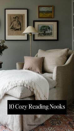 a living room filled with furniture and pictures on the wall