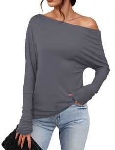 PRICES MAY VARY. 【 Asymmetrical Top】: Sexy Off Shoulder Tops Women. Shirt falls off the shoulder giving a sexy look, while with extra long sleeves gather at the wrists for added edge. Trendy, lightweight top featuring an asymmetrical off-shoulder design Add a touch of elegance to your wardrobe with this effortless piece 【Lightweight, Soft & Stretchy Fabric】 ：Show off some skin and keep things cozy in this comfy off shoulder top. The material is soft ,drapes well and high-stretches. Lightweight , Casual Asymmetrical Top For Fall, Non-stretch Tops For Night Out In Fall, Non-stretch Solid Color Top For Night Out, Trendy Gray Top For Night Out, Non-stretch Gray Fall Tops, Off-shoulder Solid Color Top For Fall, Solid Color Off-shoulder Top For Fall, Trendy Asymmetrical Stretch T-shirt, Gray Top For Fall