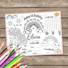 a happy birthday coloring page with colored pencils and crayons on the table