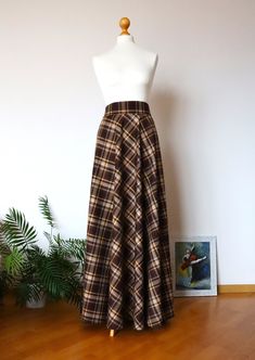 "Winter plaid skirt Plaid skirt  Wool skirt  women Midi skirt Winter skirt  Long tartan woman skirt Skirt with pocket Wool skirt Warm skirt  The skirt has two pockets. The skirt has a removable belt. The skirt has a zipper. Full standart length (from waist to hem) - \"43'' / 110cm . I can customize this skirt in every size and length free of charge, just send me measurements. Also available in other colors:  Red tartan maxi skirt :  https://www.etsy.com/listing/657341561/red-tartan-maxi-skirt-re Brown Plaid Maxi Skirt, Fall Full Length Lined Skirt, Fitted Brown Pleated Mini Skirt, Lined Mini Wrap Skirt For Fall, Fall Full Length Brown Maxi Skirt, Brown Full-length Maxi Skirt For Fall, Brown Full Length Maxi Skirt For Fall, Full Length Pleated Skirt For Fall, Elegant Brown Full-length Maxi Skirt