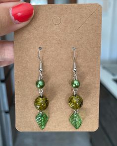 Get in tune with nature with this stunning pair of leaf green earrings 🍃 perfect for summer or any fun occasion! - Lightweight and designed for comfort  - Sterling silver earring hooks  - Perfect quality  Message me if you have any questions at all :) Green Nickel Free Dangle Earrings, Nickel-free Green Dangle Earrings, Green Nickel-free Dangle Earrings, Elegant Green Leaf-shaped Earrings, Nickel-free Green Drop Earrings, Green Nickel-free Drop Earrings, Handmade Green Dangle Flower Earrings, Green Dangle Flower Earrings For Gift, Green Leaf-shaped Jewelry Gift