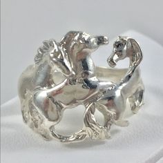 Nwt Sterling Silver .925 Ring Which I Call "Wild Horses" After The Song By The Rolling Stones. This Ring Is Handmade By Me, No Lead Or Tin Fillers Used. High Quality And Made To Last. This Is Not A Cheap Flimsy Import. I’ve Also Rhodium Plated The Sterling Silver Which Gives It A Very Bright Finish. The 3 Horses Travel 3/4 Around The Ring In Different Poses. The Design Is 3/4 Of An Inch In Height. Weighs 7 Grams. Specify Antiqued ( Photos 6-8) Or Not Antiqued. Firm Price For This Art Piece! Classic Sterling Silver Hand Cast Rings, Classic Hand Cast Sterling Silver Rings, Heirloom Sterling Silver Hand Cast Jewelry, Heirloom Sterling Silver Open Ring, Formal Hand Cast Sterling Silver Rings, Heirloom Hand Cast Sterling Silver Jewelry, Elegant Hand Cast Jewelry For Anniversary, Heirloom Style Sterling Silver Nickel-free Jewelry, Nickel-free Silver Heirloom Jewelry